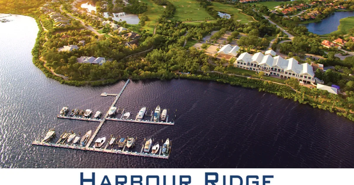 Aerial view of Harbour Ridge Yacht & Country Club showcasing waterfront marina, golf course, and luxury residential community in Florida.